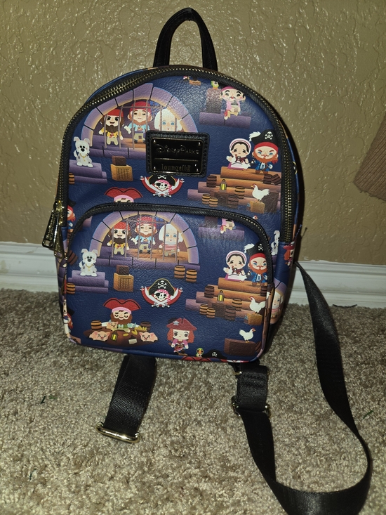 Loungefly Handbags - Loungefly Navy Pirates Of The Caribbean Mini Backpack with Gold Accents